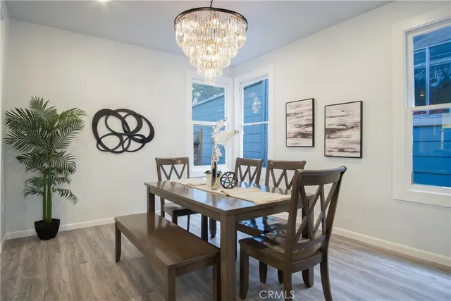 a view of dining table and chairs