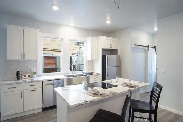 a room with a couch and a large window