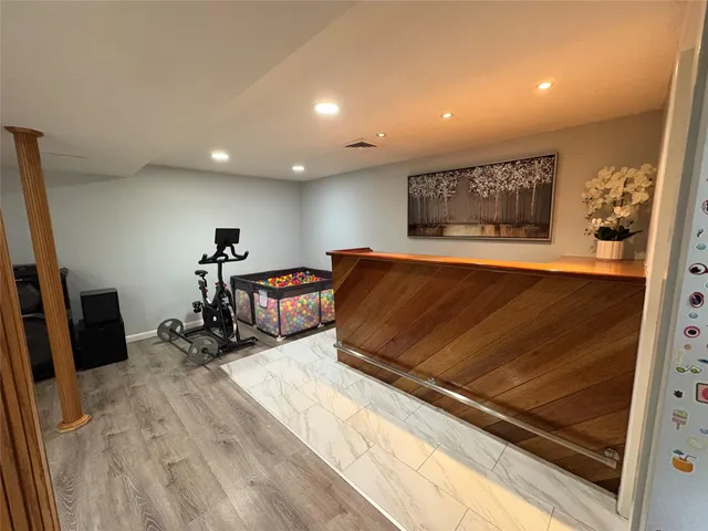 a view of a room with gym equipment