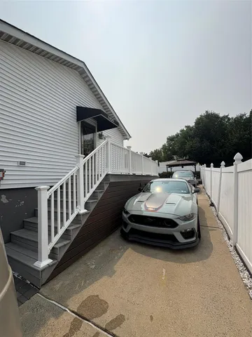 a car parked in front of a house