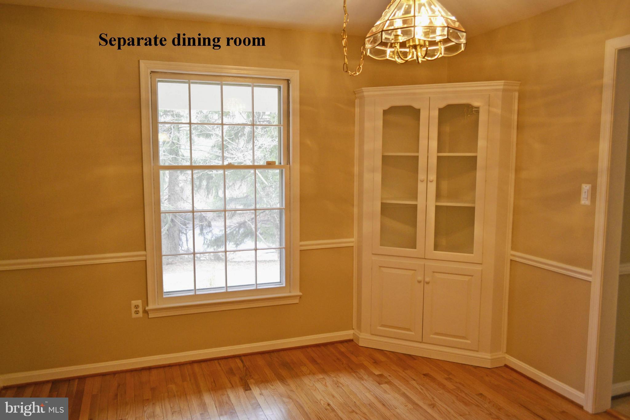 2404 Norbeck Road Silver Spring, MD 20906 - Photo 3 of 25 Dining Room with built-in corner cabinet