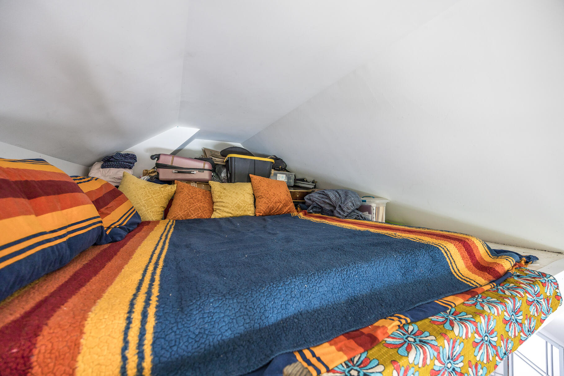 23 Old Bridge Road Truro, MA 02666 - Photo 20 of 44 a bedroom with a bed and a lamp