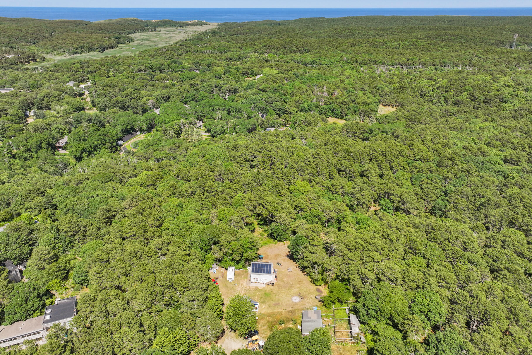 23 Old Bridge Road Truro, MA 02666 - Photo 2 of 44 a view of a big yard with an outdoor space