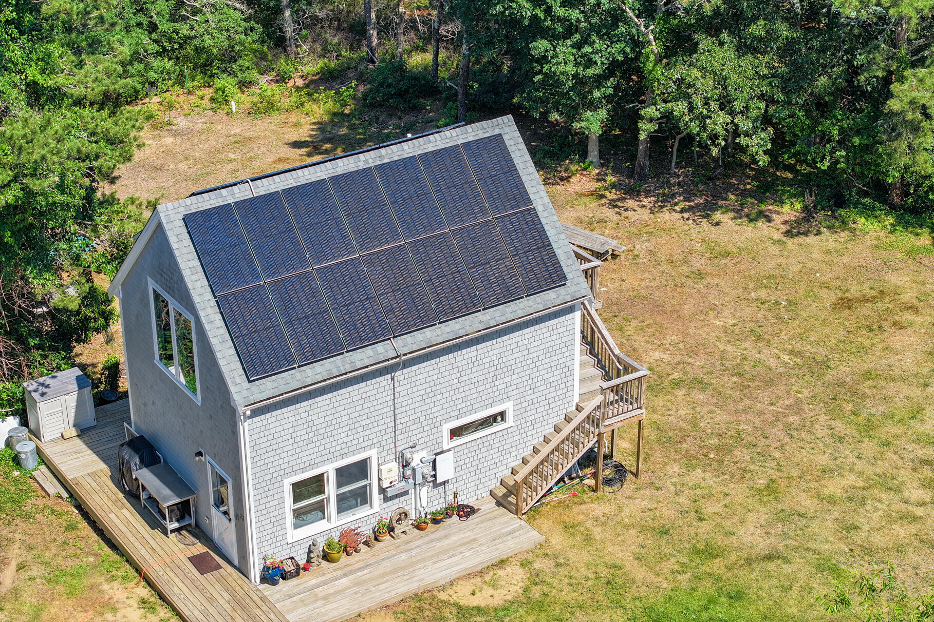 23 Old Bridge Road Truro, MA 02666 - Photo 3 of 44 a balcony view with flat screen tv
