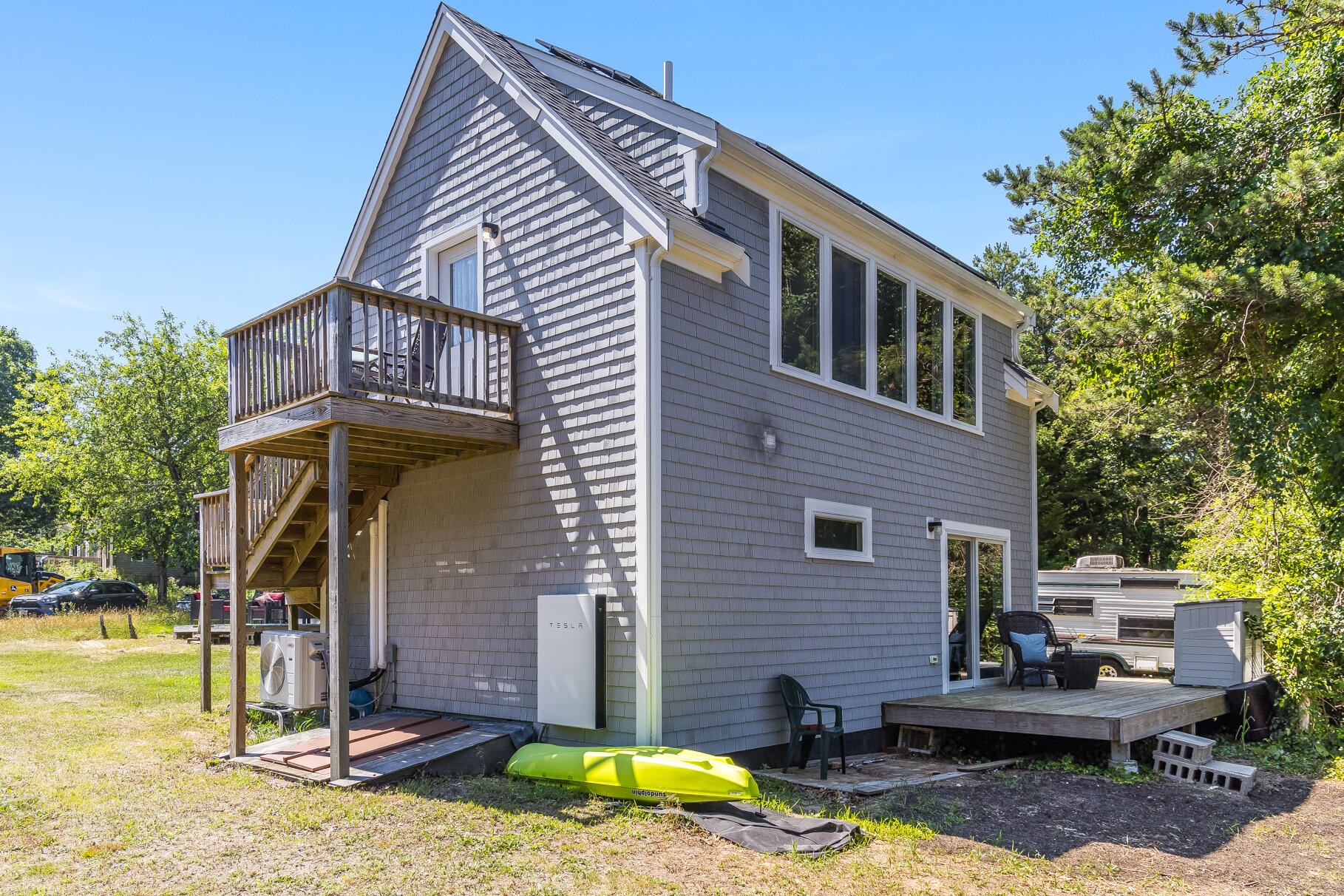 23 Old Bridge Road Truro, MA 02666 - Photo 31 of 44 a front view of a house with swimming pool