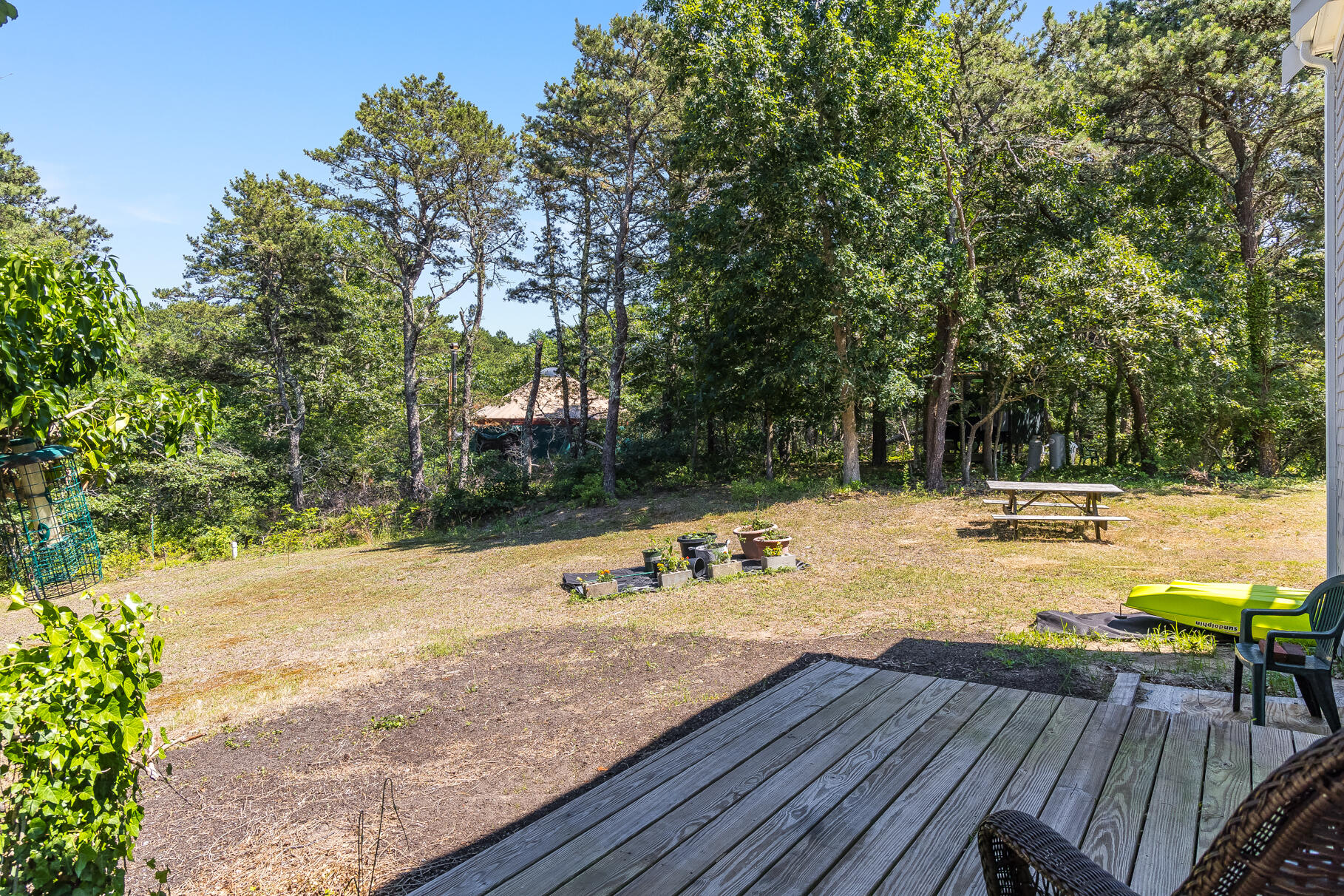 23 Old Bridge Road Truro, MA 02666 - Photo 7 of 44 a view of a swimming pool with a patio