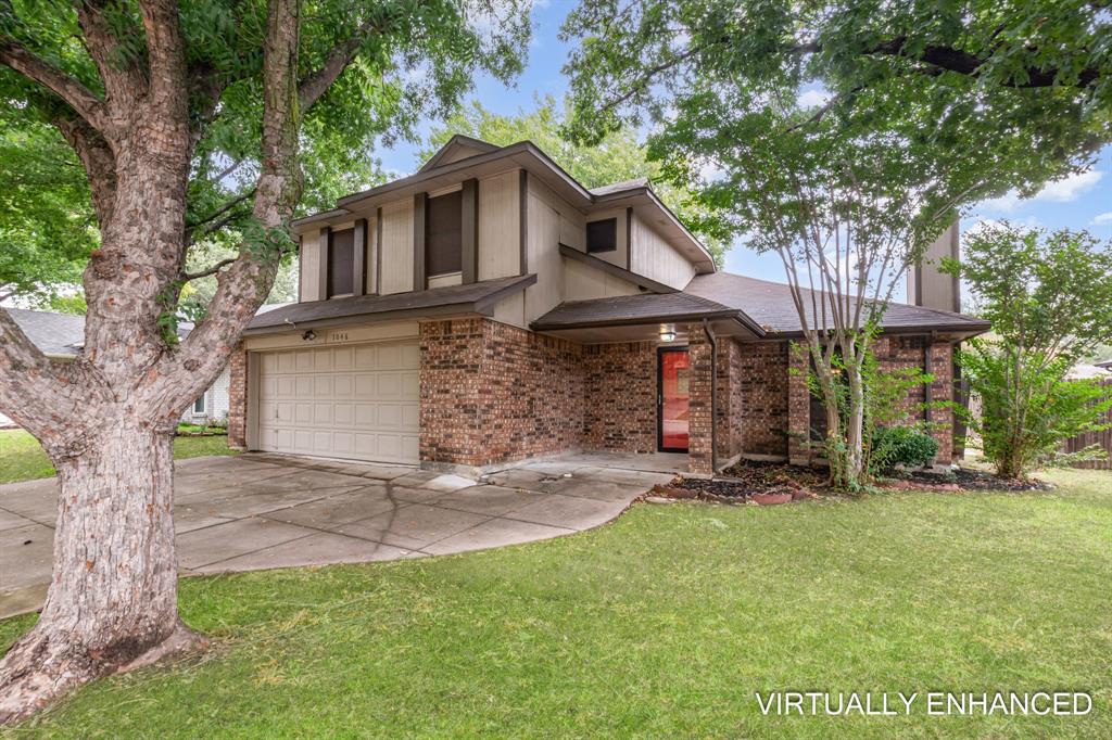 1046 Colony Street Flower Mound, TX 75028 - Photo 1 of 21 a front view of a house with a yard