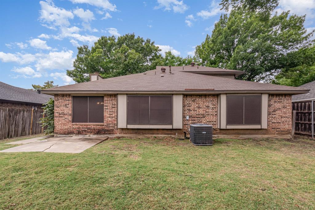 1046 Colony Street Flower Mound, TX 75028 - Photo 20 of 21 a front view of a house with garden