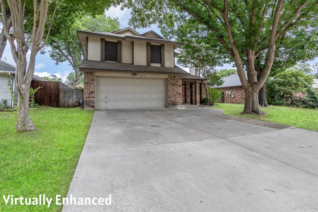 1046 Colony Street Flower Mound, TX 75028 - Photo 2 of 21 a view of a house with a yard and large tree