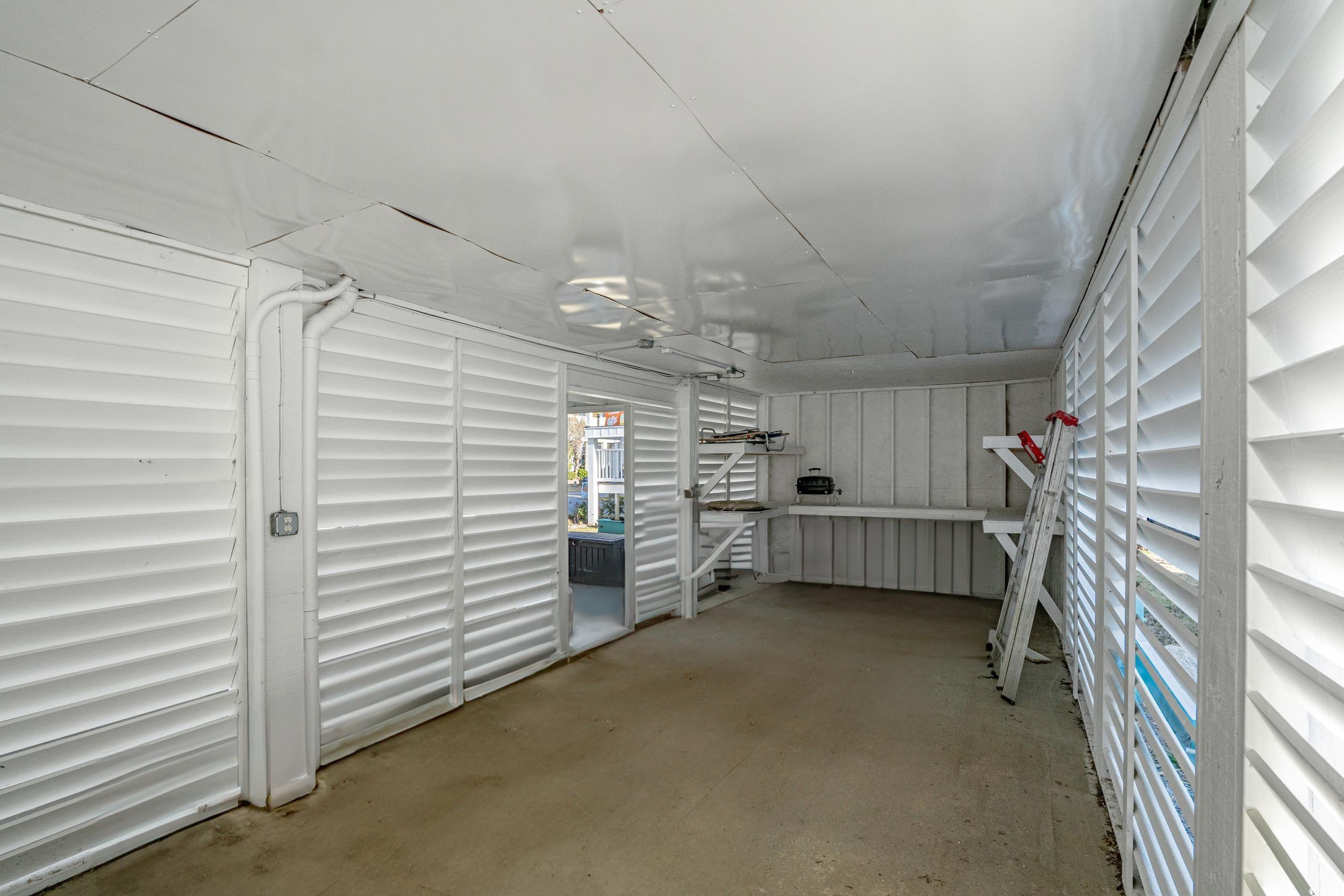 147 Anglers Drive Murrells Inlet, SC 29576 - Photo 31 of 37 Ground Floor Storage