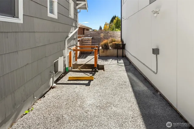a view of a balcony with chairs