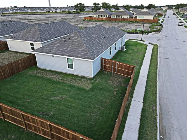 a view of backyard of house