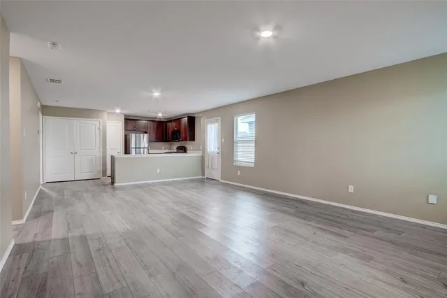 a view of a livingroom with wooden floor
