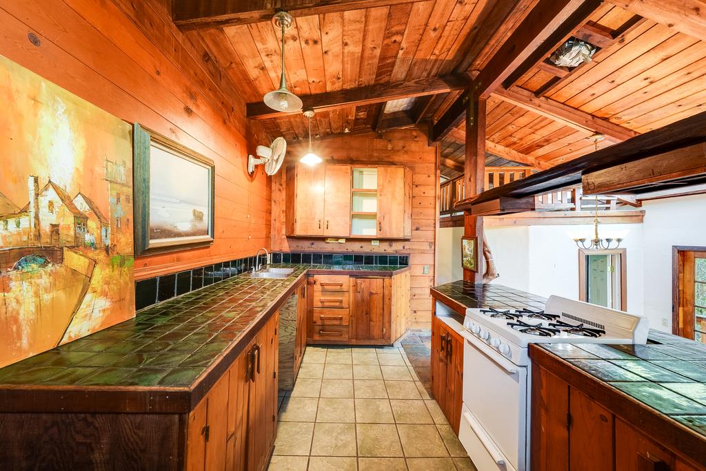 400 Red Hawk Lane Aptos, CA 95003 - Photo 5 of 9 a kitchen with stainless steel appliances granite countertop a stove a sink and dishwasher