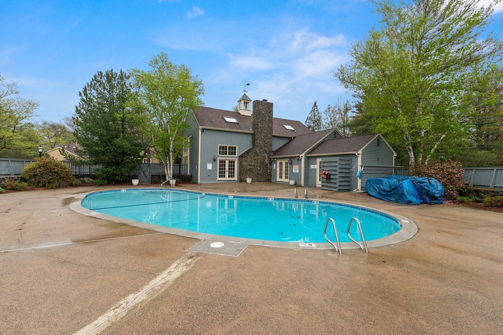 7 Carriage Way Danvers, MA 01923 - Photo 27 of 31 a front view of house with outdoor space and swimming pool