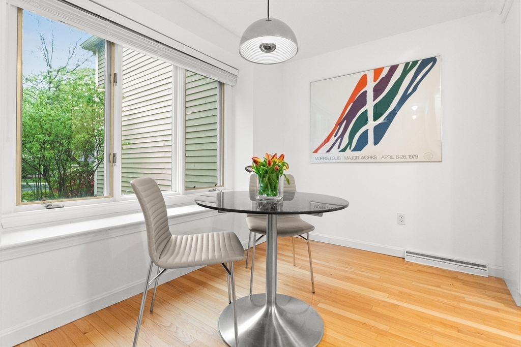 7 Carriage Way Danvers, MA 01923 - Photo 4 of 31 a view of a workspace with furniture and a window