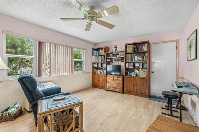 a living room with furniture and a window