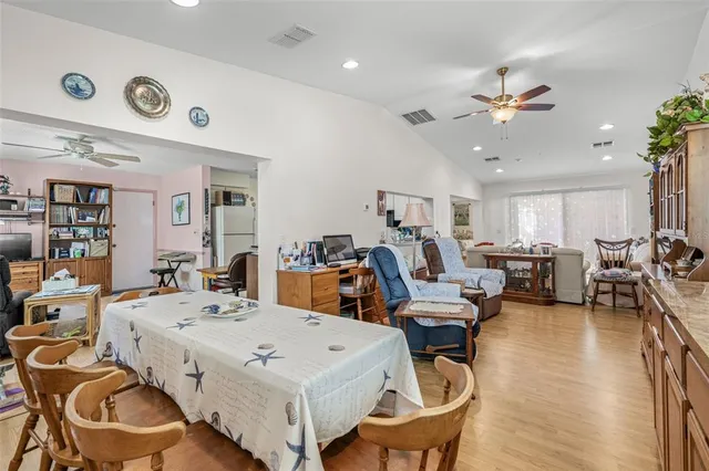 a very nice looking dining room with a table and chairs