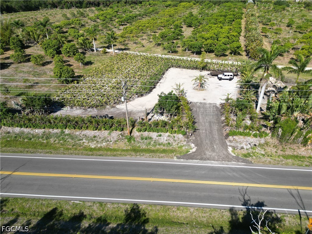 11851 Stringfellow Road Bokeelia, FL 33922 - Photo 11 of 26 a view of a garden from a window