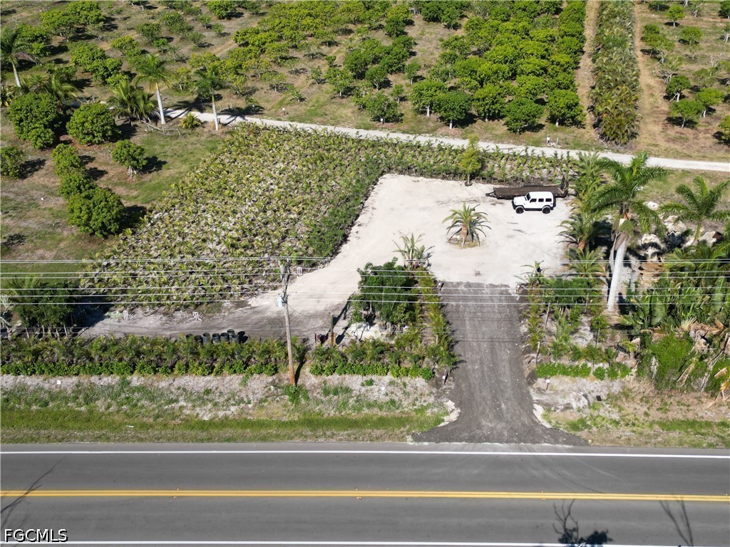 11851 Stringfellow Road Bokeelia, FL 33922 - Photo 12 of 26 a view of a yard with a fountain