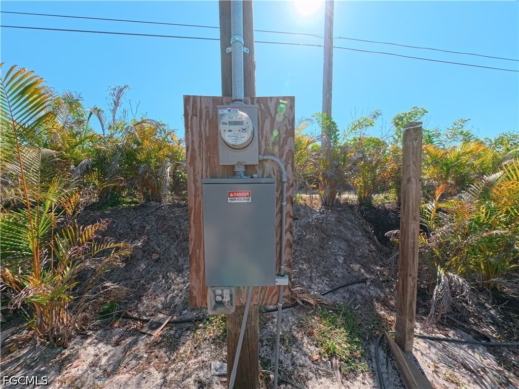 11851 Stringfellow Road Bokeelia, FL 33922 - Photo 23 of 26 a sign that is on the side of the road