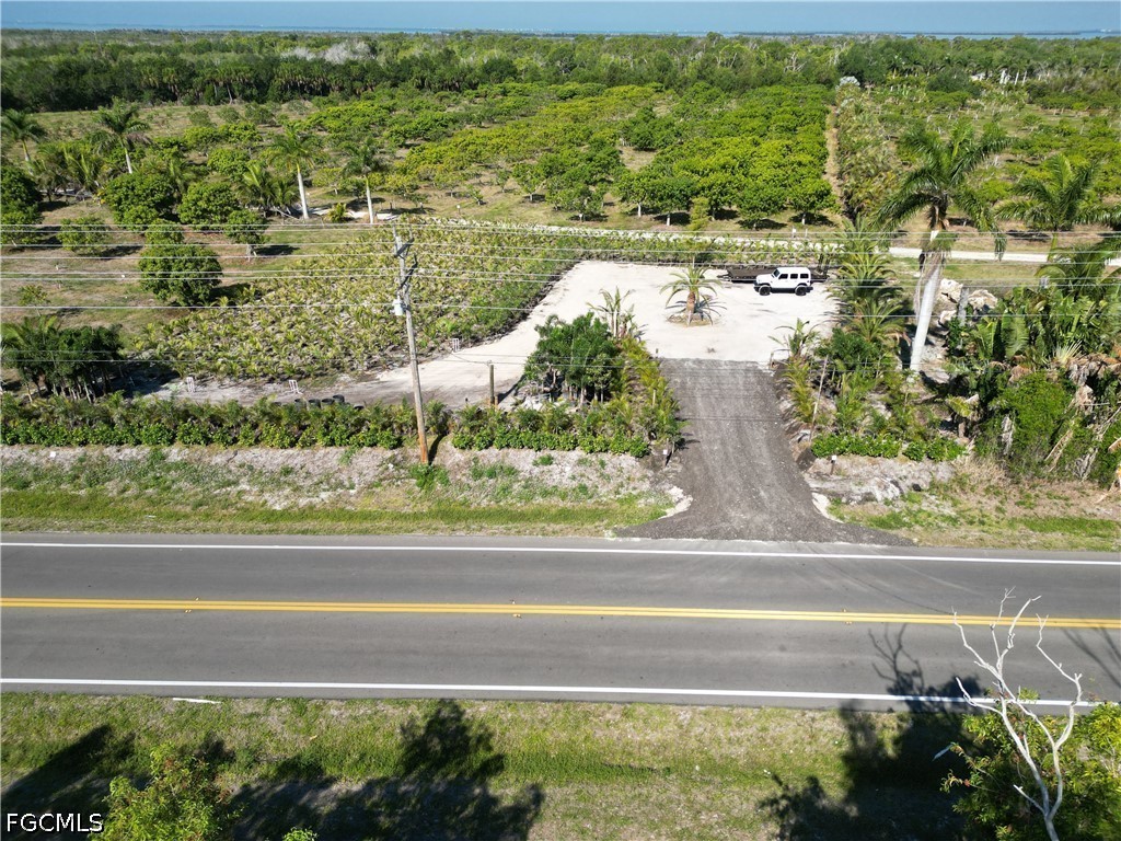 11851 Stringfellow Road Bokeelia, FL 33922 - Photo 10 of 26 a view of a lake from a yard
