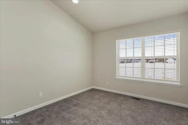 a view of wooden floor and a sink
