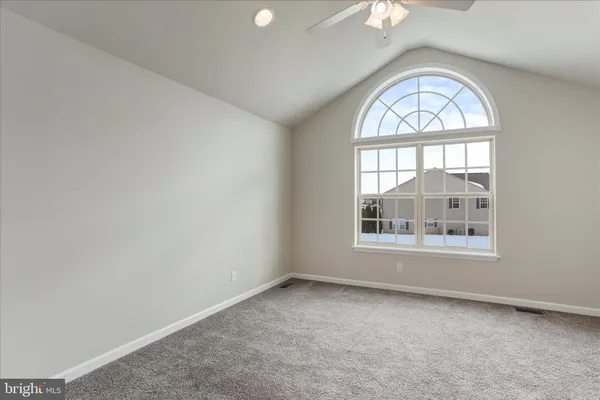 an empty room with a bathroom