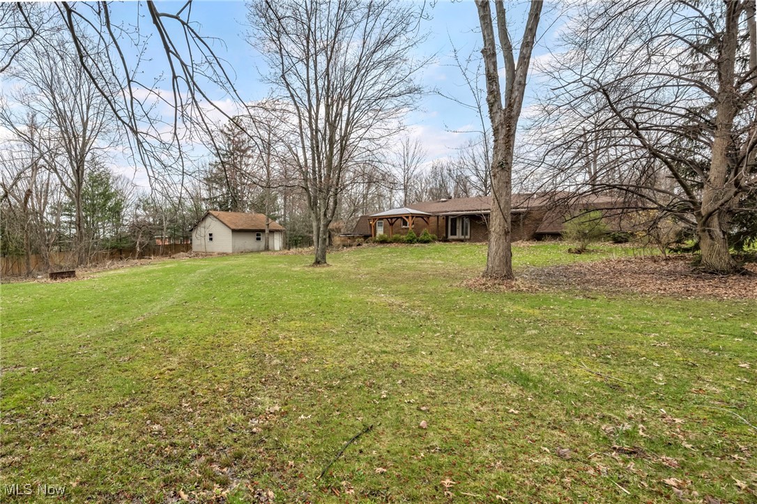 2680 Orchard Ext Road Wickliffe, OH 44092 - Photo 7 of 30 View of yard featuring an outbuilding