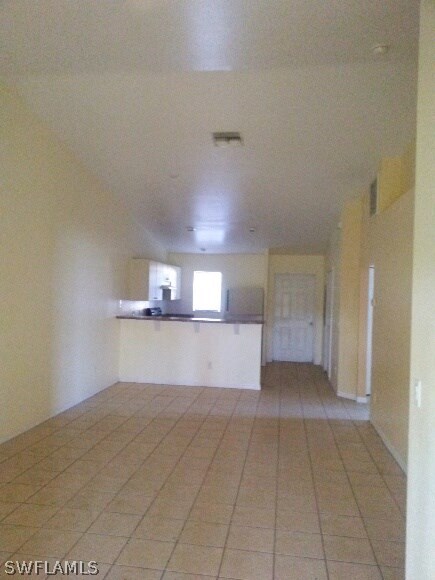4533 26th Street Southwest Lehigh Acres, FL 33973 - Photo 2 of 10 a view of a kitchen with a sink