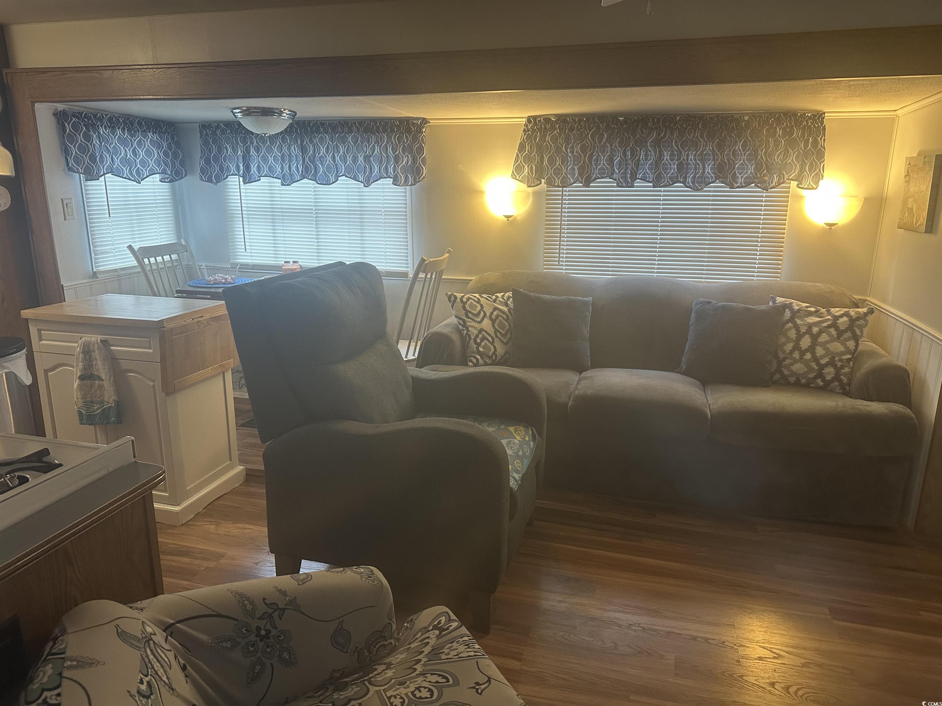 613-431 5th Avenue South Myrtle Beach, SC 29577 - Photo 11 of 36 Living area with dark wood-type flooring
