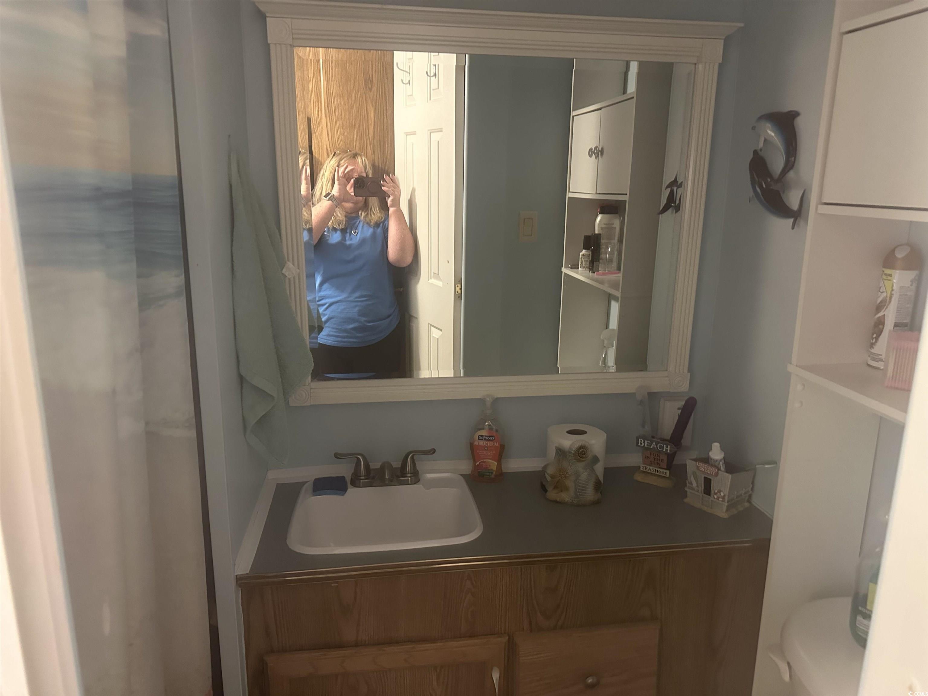 613-431 5th Avenue South Myrtle Beach, SC 29577 - Photo 14 of 36 Bathroom with toilet and vanity