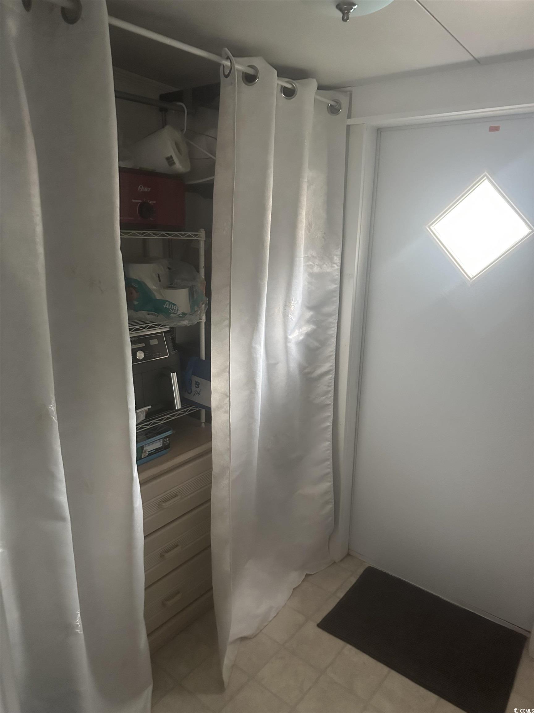 613-431 5th Avenue South Myrtle Beach, SC 29577 - Photo 15 of 36 Laundry with storage closet