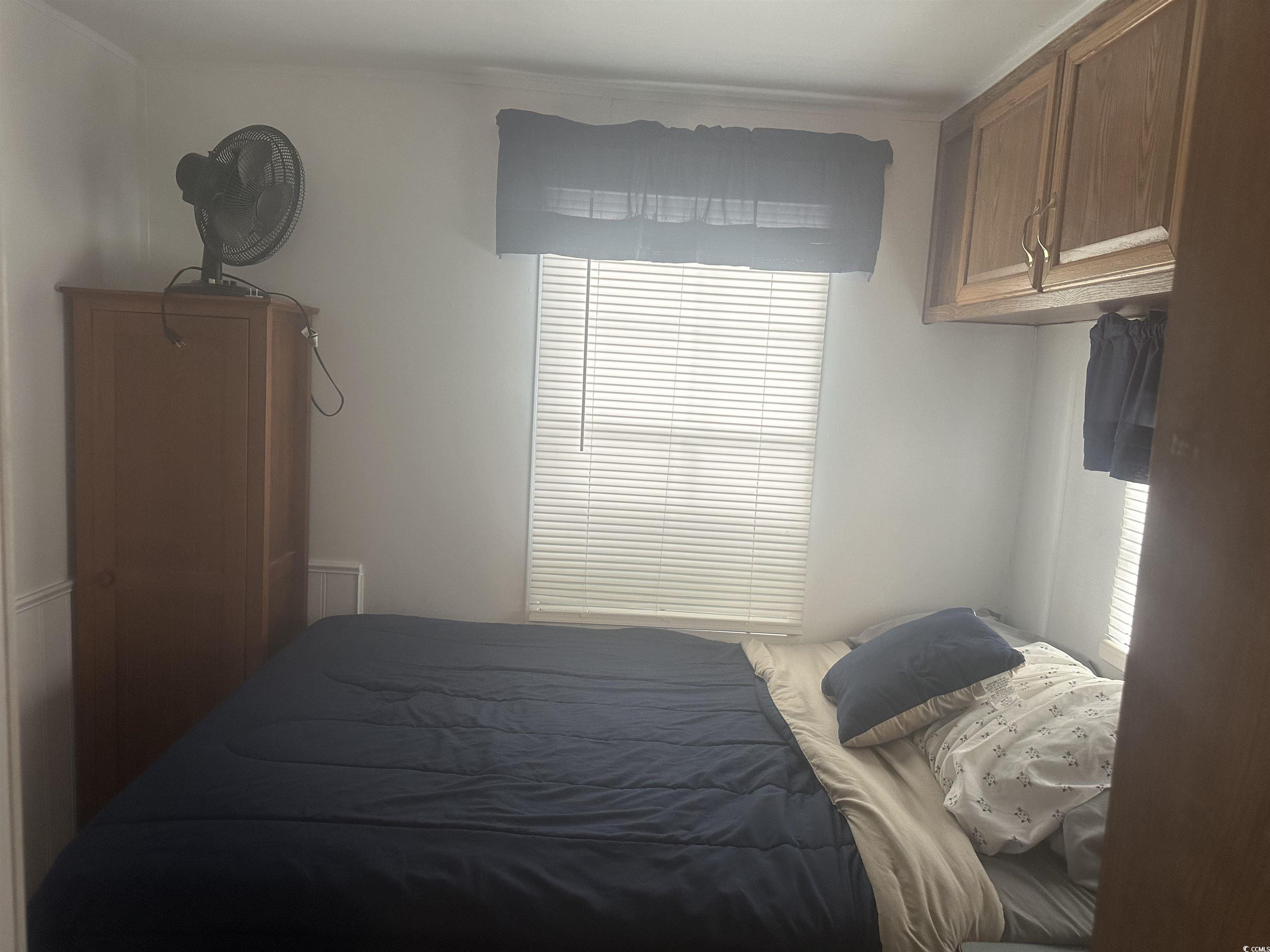 613-431 5th Avenue South Myrtle Beach, SC 29577 - Photo 19 of 36 Bedroom featuring multiple windows