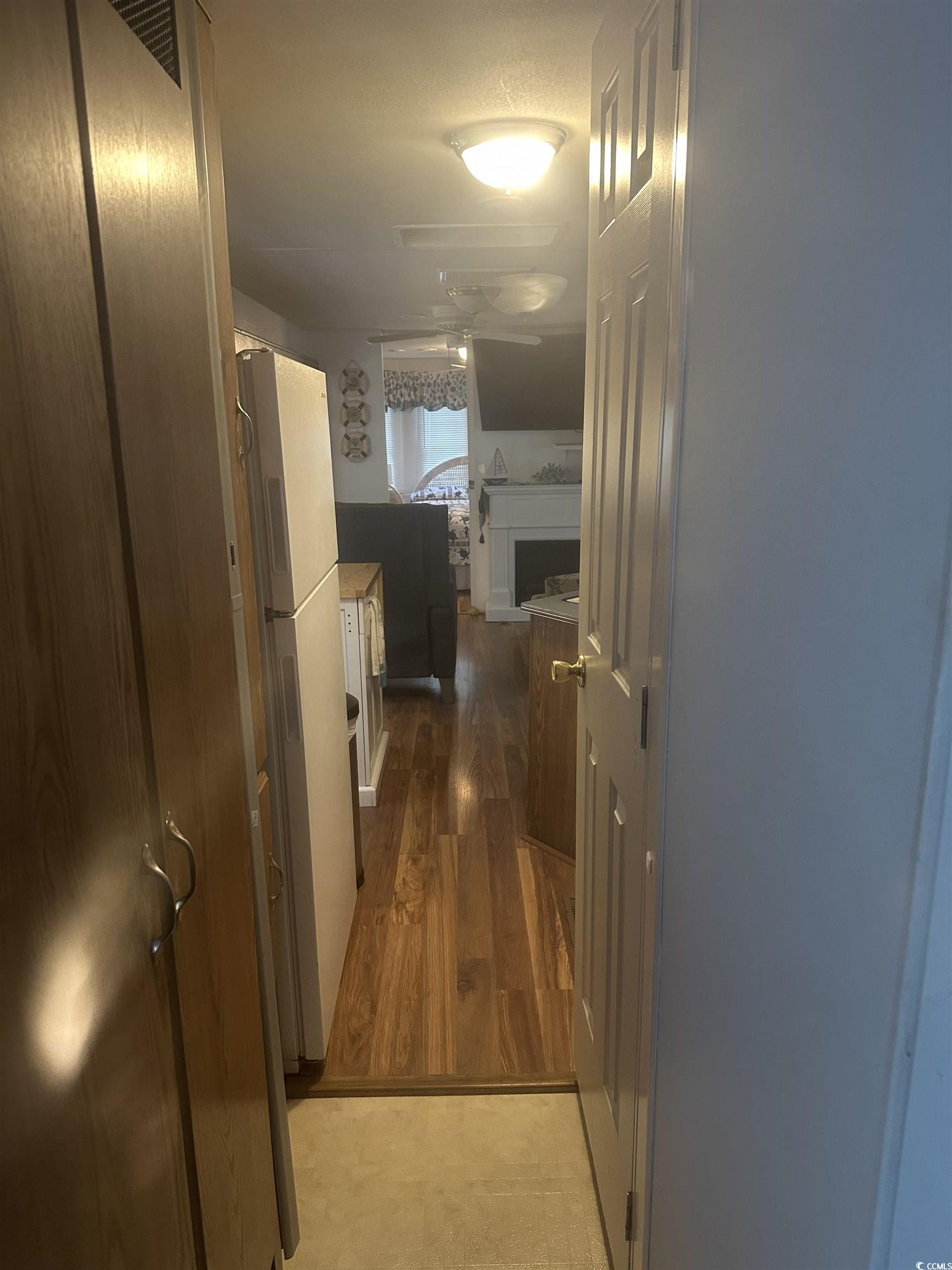 613-431 5th Avenue South Myrtle Beach, SC 29577 - Photo 20 of 36 Corridor with dark wood-type flooring