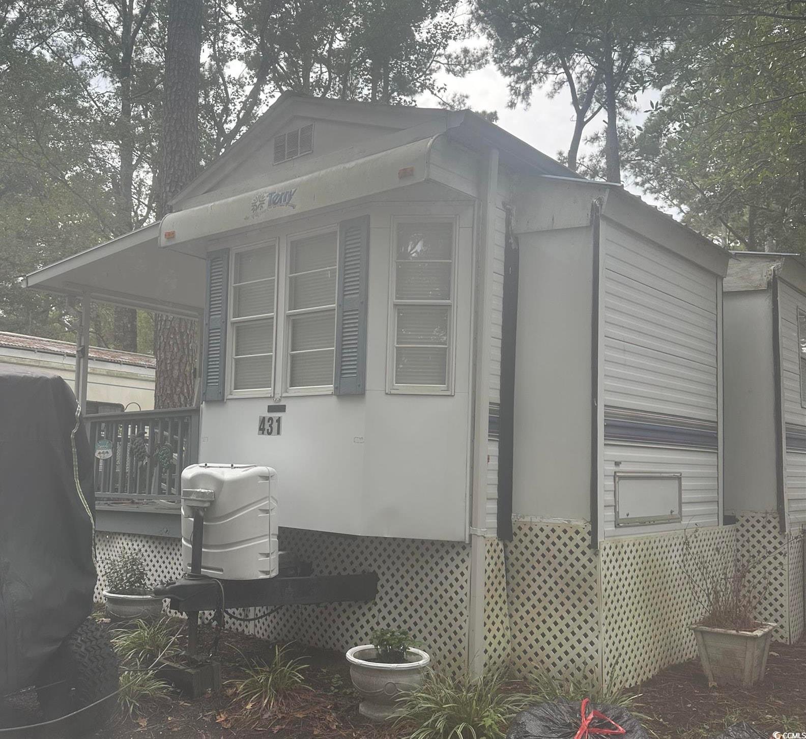 613-431 5th Avenue South Myrtle Beach, SC 29577 - Photo 22 of 36 Rear view of house featuring a deck