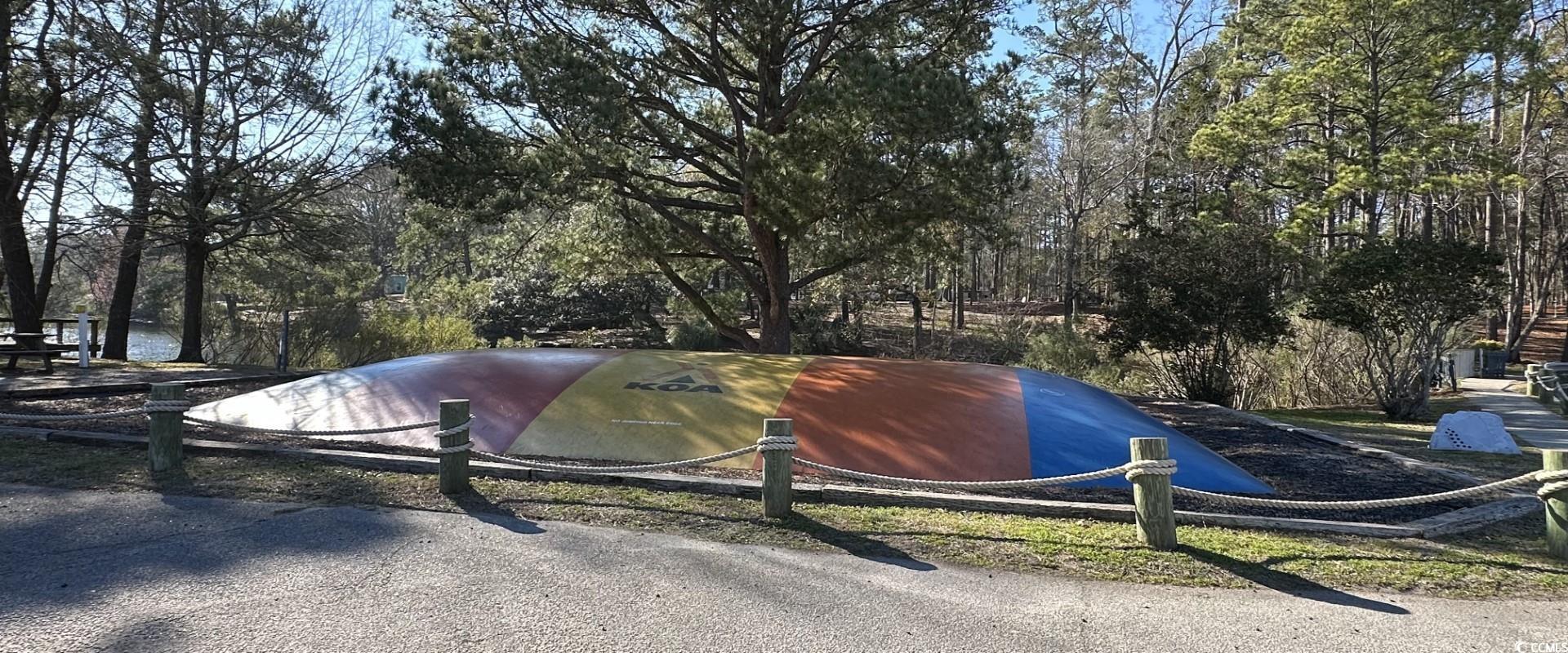 613-431 5th Avenue South Myrtle Beach, SC 29577 - Photo 32 of 36 View of yard featuring view of wooded area
