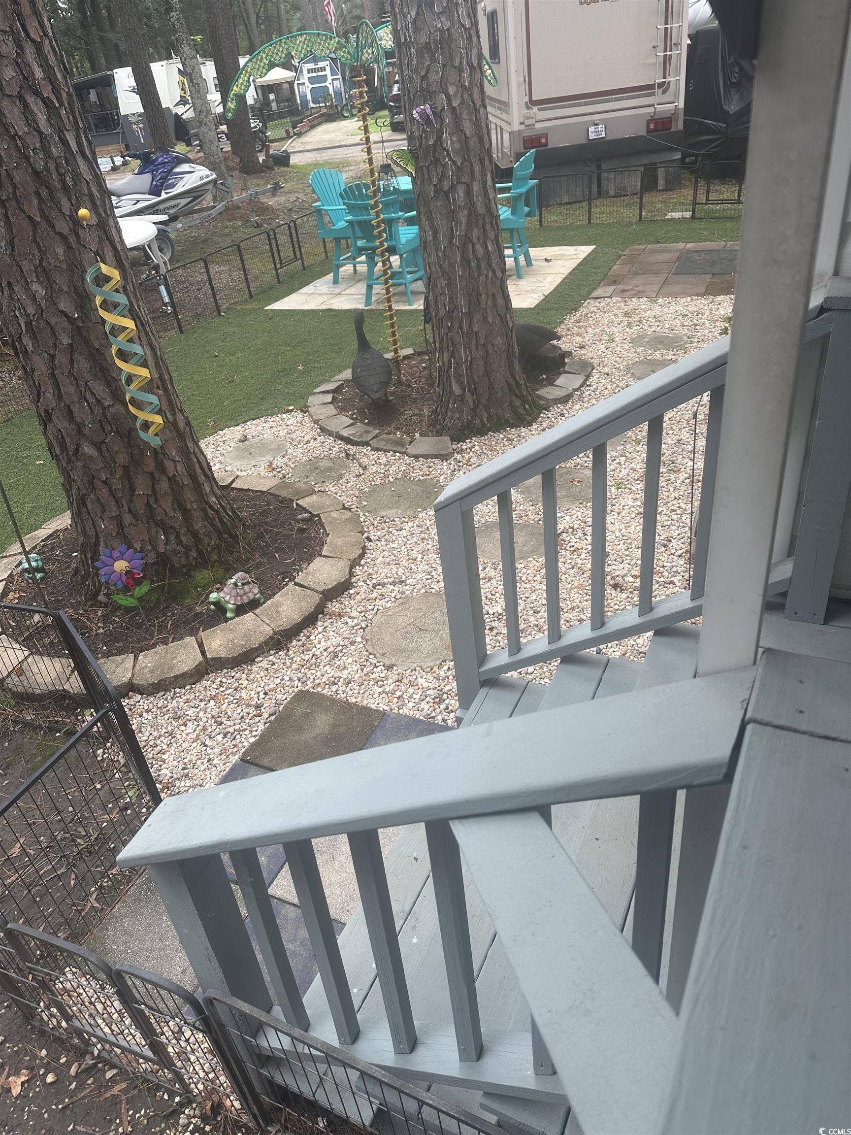 613-431 5th Avenue South Myrtle Beach, SC 29577 - Photo 4 of 36 View of yard with a patio area