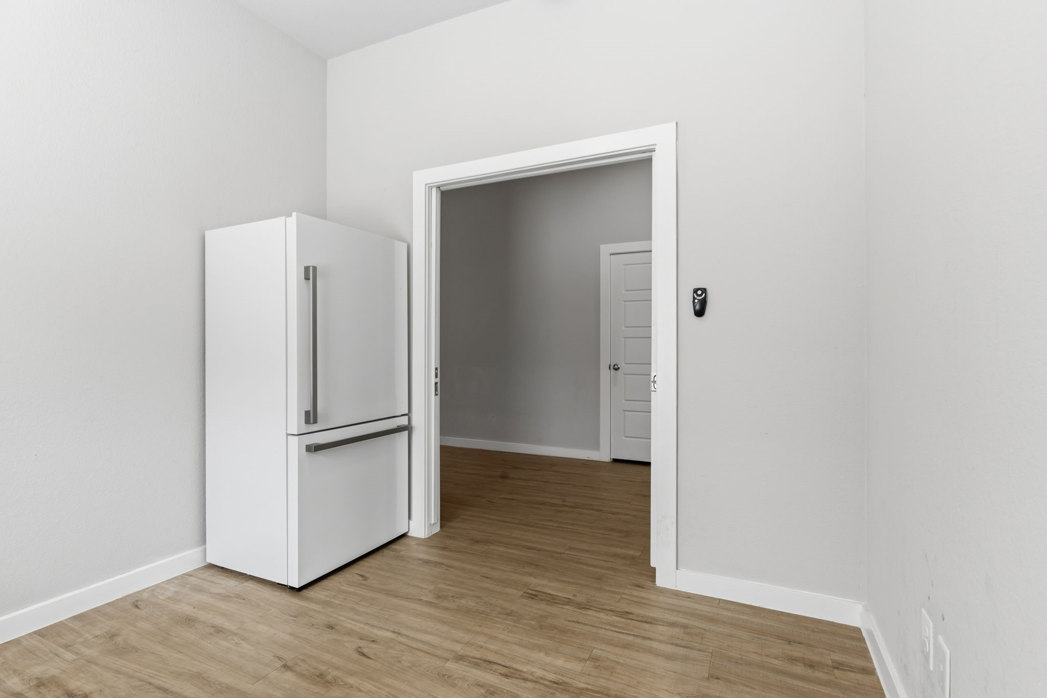14914 Big Bend Ranch Drive Cypress, TX 77433 - Photo 27 of 49 a view of walk in closet with wooden floor