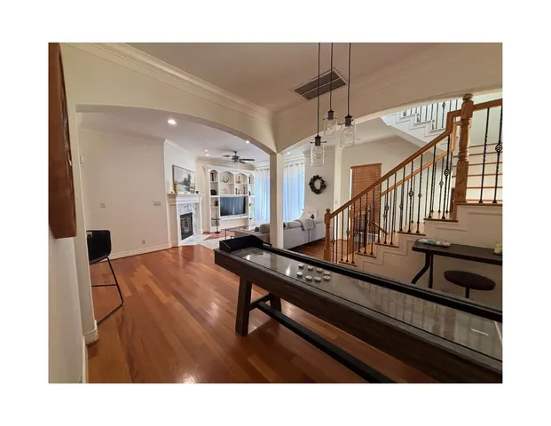 a view of a living room and workspace