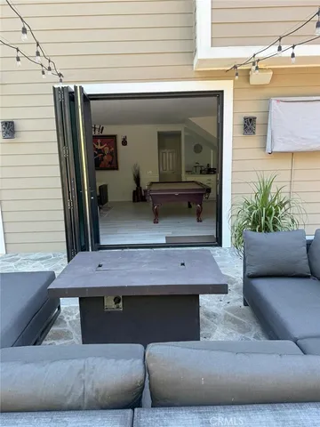 a front view of a house with chairs
