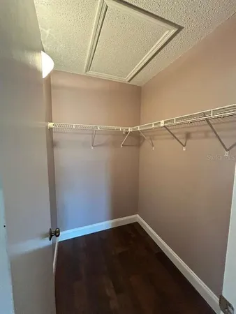 a view of a room with racks on the wall