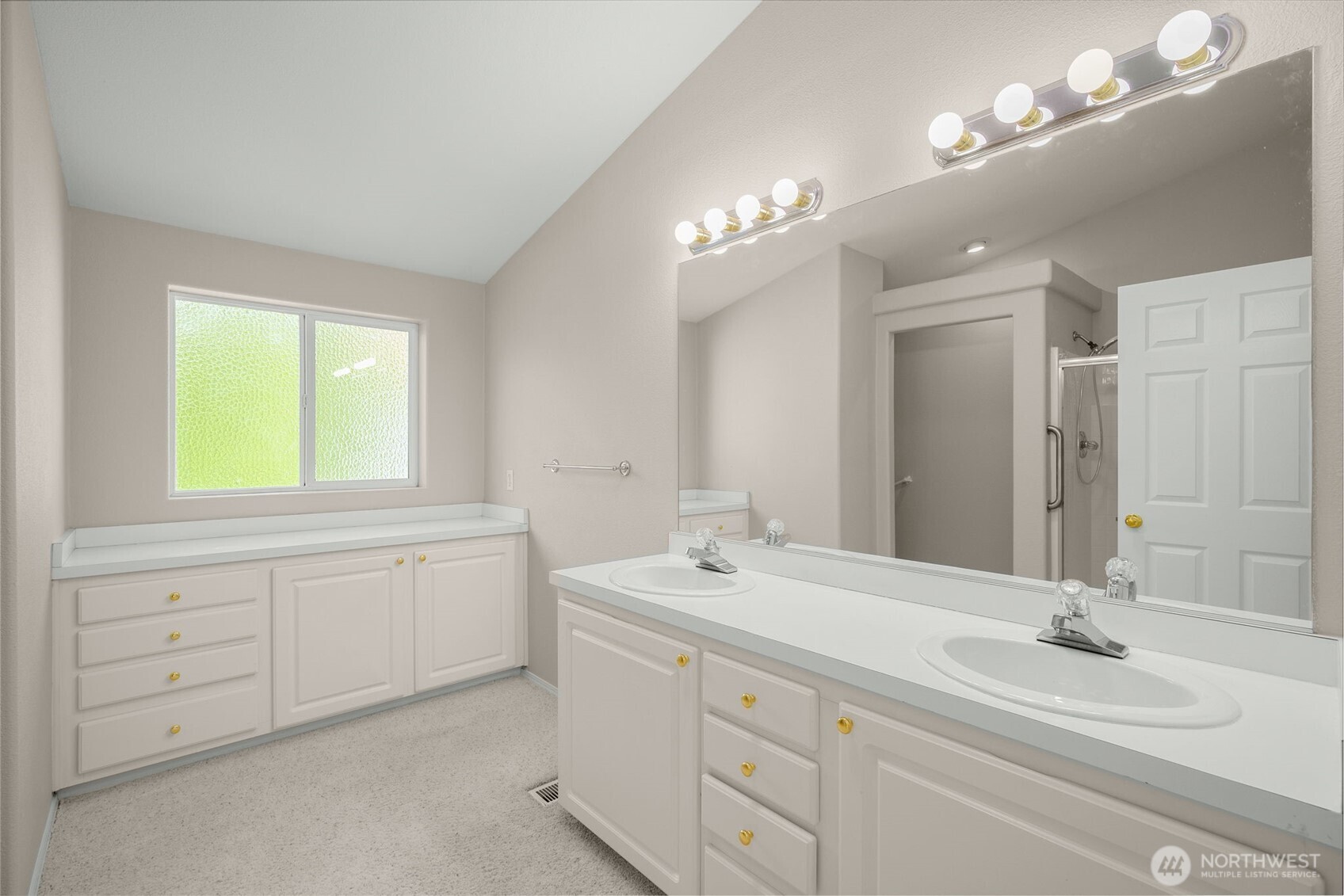 23606 Lake Drive West Bothell, WA 98021 - Photo 17 of 30 a bathroom with a sink vanity and a mirror