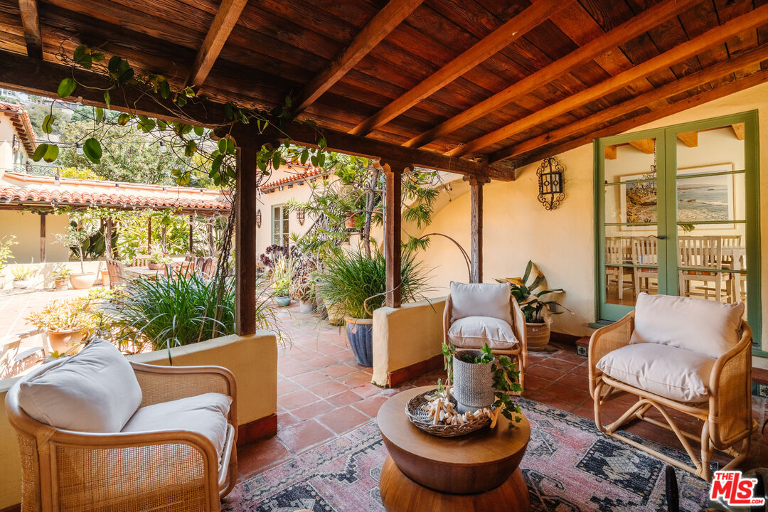 35145 Beach Road Dana Point, CA 92624 - Photo 15 of 57 a living room with furniture and a large window