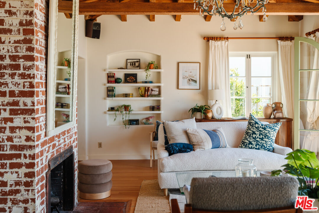 35145 Beach Road Dana Point, CA 92624 - Photo 18 of 57 a living room with furniture and a fireplace