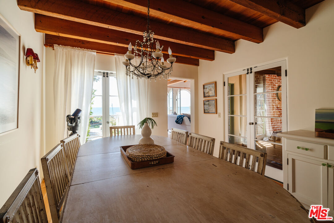 35145 Beach Road Dana Point, CA 92624 - Photo 20 of 57 a living room with furniture and a chandelier