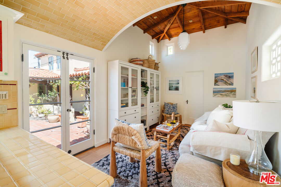 35145 Beach Road Dana Point, CA 92624 - Photo 27 of 57 a living room filled with furniture and a chandelier