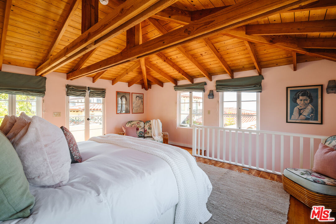 35145 Beach Road Dana Point, CA 92624 - Photo 38 of 57 a bed sitting in a bedroom next to a window