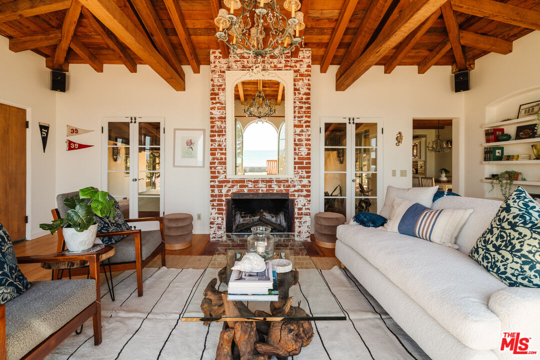 35145 Beach Road Dana Point, CA 92624 - Photo 4 of 57 a living room with furniture and a fireplace