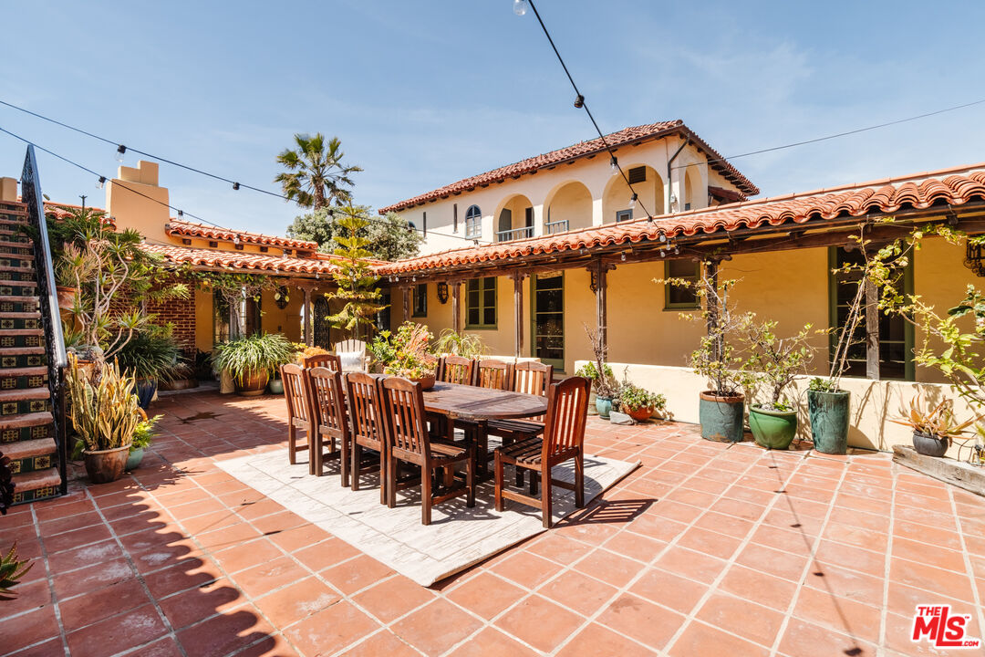 35145 Beach Road Dana Point, CA 92624 - Photo 41 of 57 a view of a dinning table and chairs in the patio